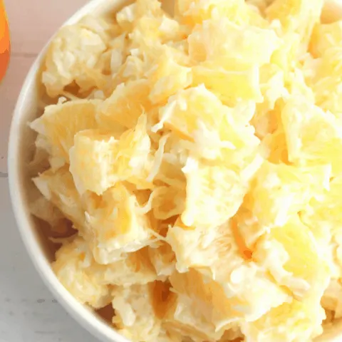 orange pieces and coconut come together in a sweet cream for the perfect low calorie dessert
