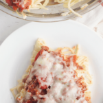 ground beef tomatoes and cheese come together over noodles for perfect comfort food