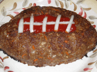 This football-shaped meatloaf, perfect for game day, sits proudly on a decorative plate. Topped with ketchup and onion strips mimicking laces, its not just a dish—its a touchdown in culinary creativity! Get the recipe to score big with your guests.