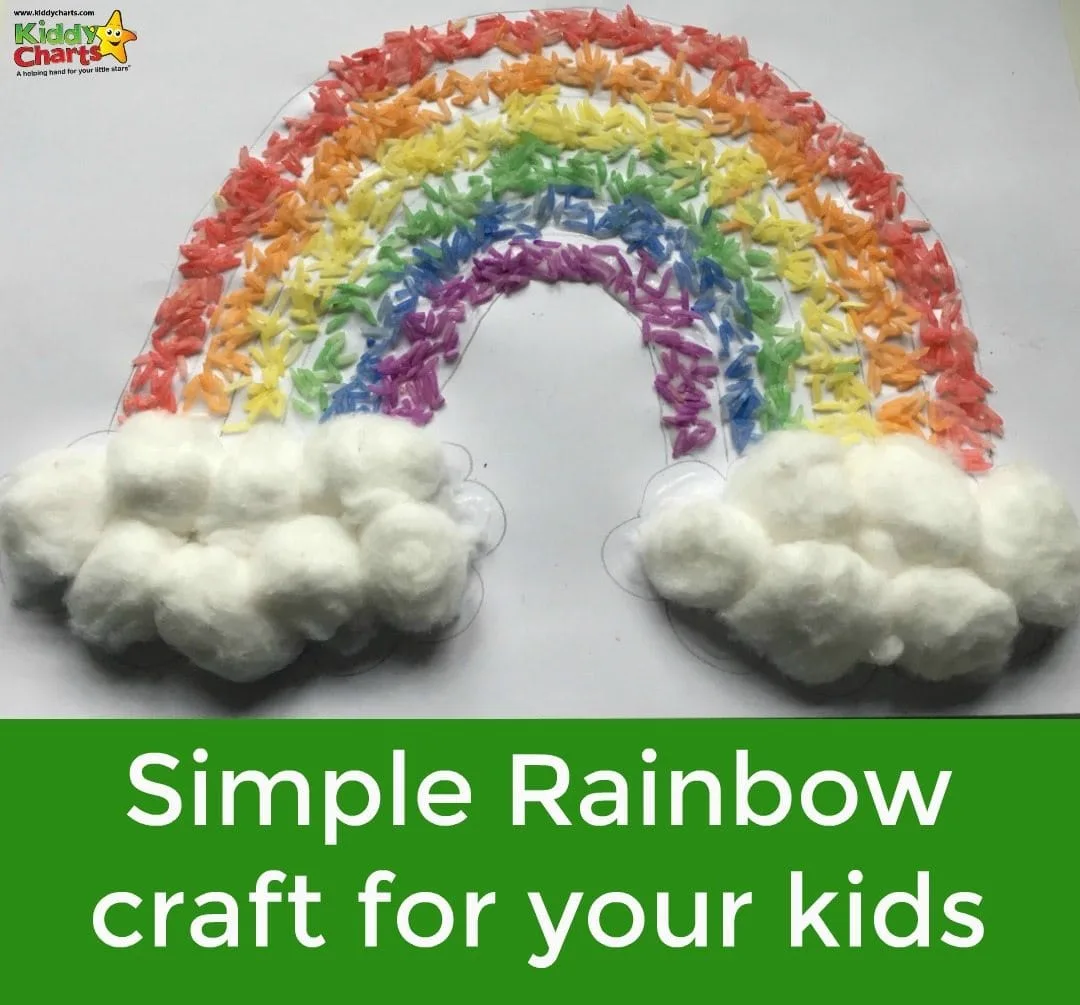 A colorful rainbow craft made from rice and cotton balls is displayed. The rainbow arcs from left to right with fluffy clouds at the end of the rainbow. A green banner below reads, Simple Rainbow craft for your kids.