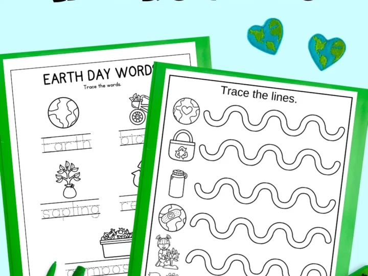 Two Earth Day worksheets, one for tracing words and the other for tracing lines, are shown with two green pencils and colorful crayons below. Background features small globe heart decorations. Earth Day Worksheets text is at the top, offering engaging educational ideas.