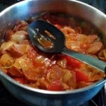 Sausage on stove with veggies