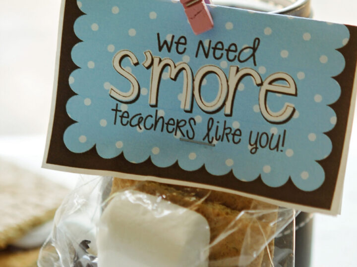 S’mores-themed teacher gift with a printable tag that reads “We need s’more teachers like you,” clipped to a bag with graham crackers, chocolate, and a marshmallow.