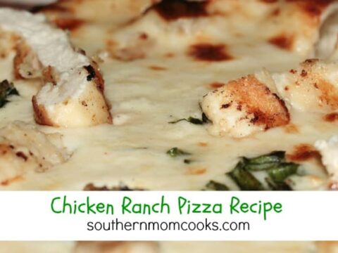 Close-up of a delightful Chicken Ranch Pizza, generously topped with tender grilled chicken, gooey melted cheese, and fresh herbs. Text overlay reads, Chicken Ranch Pizza Recipe, brought to you by southernmomcooks.com.