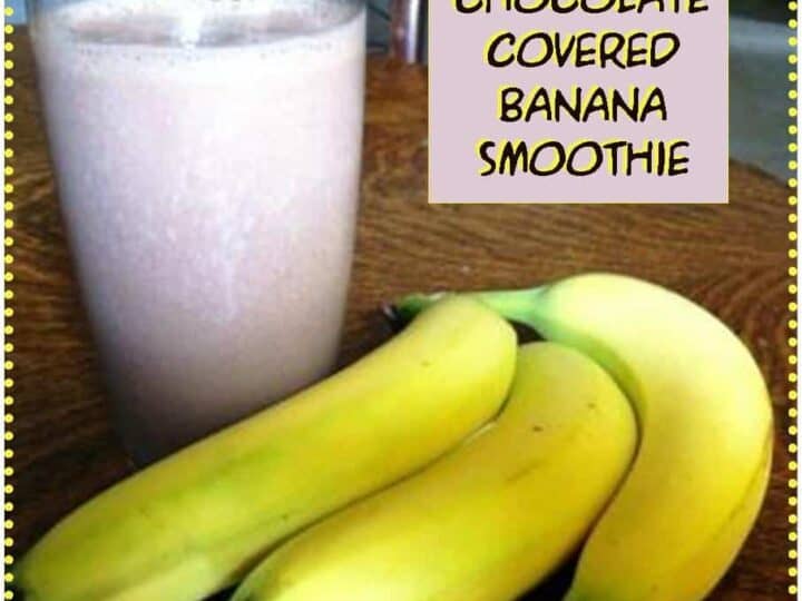 A rich chocolate smoothie sits elegantly beside a ripe bunch of bananas on a rustic wooden table. The text overlay enticingly announces Chocolate Covered Banana Smoothie. Explore more delightful recipes at www.SouthernMomCooks.com.