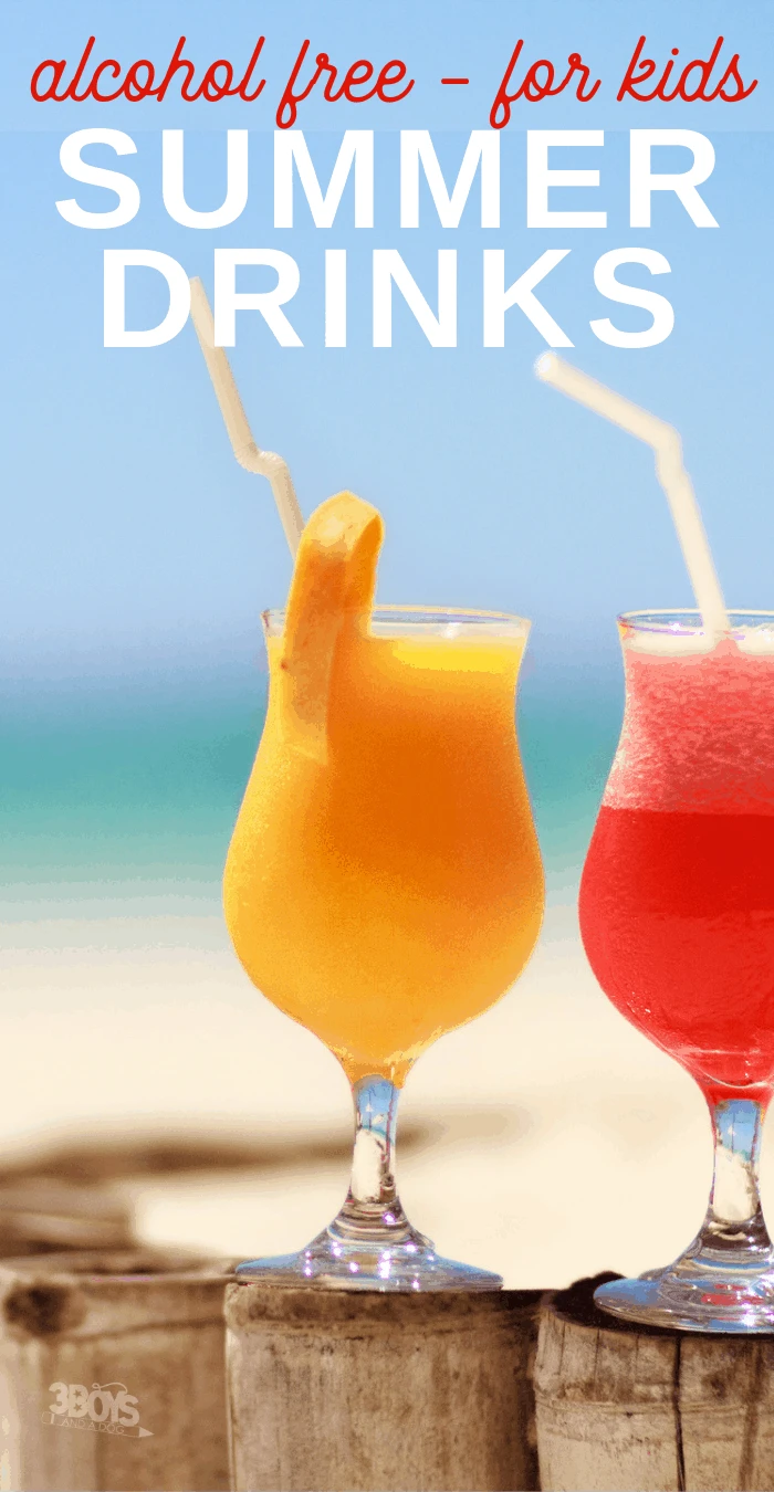 image of two tropical drinks with umbrellas on a fence surrounding a beach.