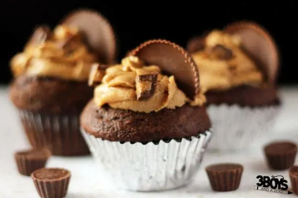 Candy Bar Cupcake Recipe for a Reese's Peanut Butter Cupcake Recipes - a delicious chocolate cake topped with lush peanut butter frosting and filled with a chocolate peanut butter center