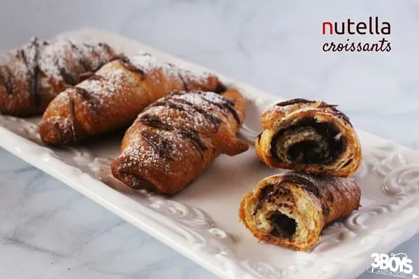 Nutella Croissants - 2 ingredients and your morning is off to a heavenly start. A breakfast recipe for Christmas morning, or a special birthday breakfast that takes less than 5 minutes to prepare.