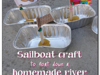 Three small foil trays with craft sailboats inside, each boasting a mast and unique fabric sails. Text overlay reads: Missouri crafts for kids: Sailboat craft to float down a homemade river. Gift of Curiosity.