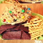 Every tailgating party needs a dessert! And there's no better to way to go big at your party than with this dessert - Monster Cookie Dough Dip. It's a fun dessert recipe every tailgater and kids will love!