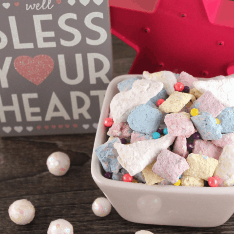 simple Chex mix snack recipe called Unicorn Puppy Chow