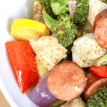 sheet pan chicken dinner with sausage and veggies