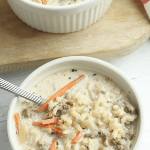 ground hamburger meat and creamy wild rice in the crockpot