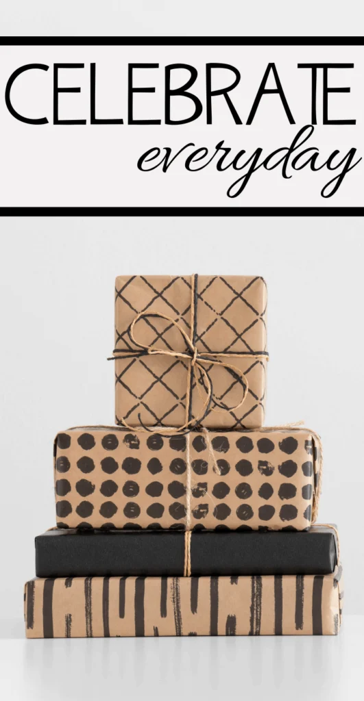 Stack of four wrapped gifts with the words Celebrate Everyday