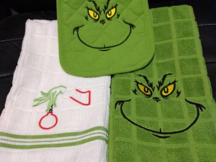 Image for Grinch Mean one kitchen towel set.