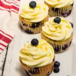 delicious lemon cupcakes filled with fresh blueberries
