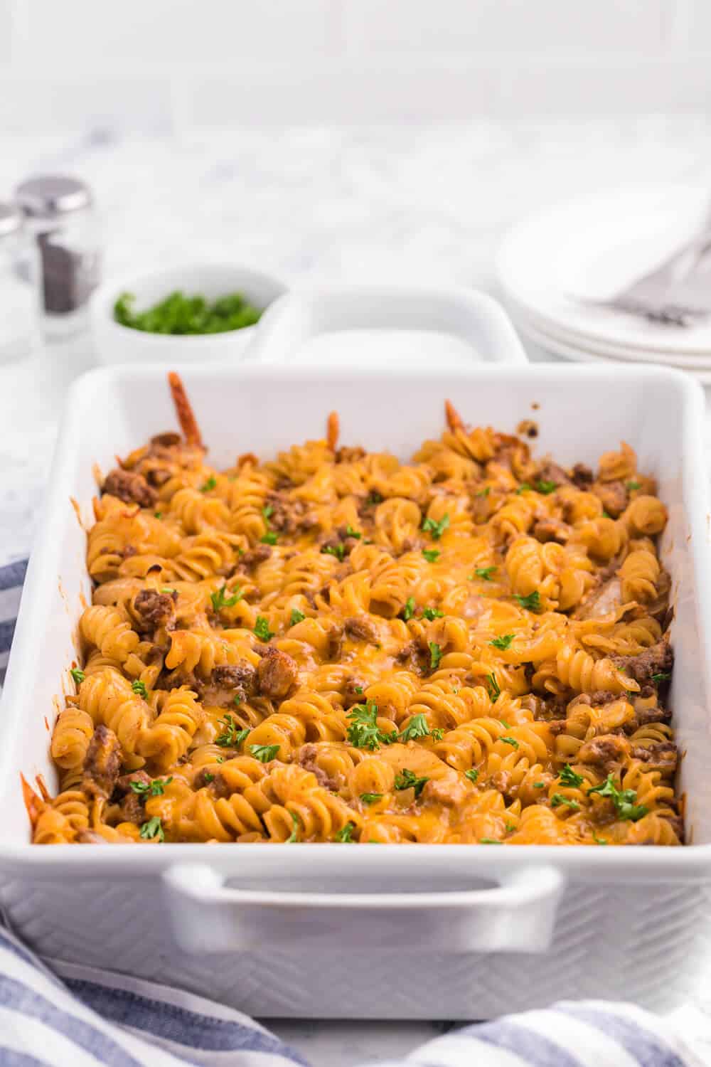 Cheesy BBQ beef casserole with pasta and melted cheese