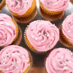 pin image that reads sugar plum cupcakes easy dessert with frosted cupcakes on a platter