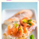 extra pin for famous washington recipes with image of salmon sandwich on a white plate