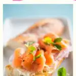 extra pin for famous washington recipes with image of salmon sandwich on a white plate