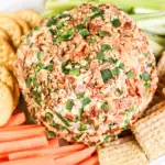 pin image that reads cheese ball easy snack with picture of cheese ball and crackers and carrots