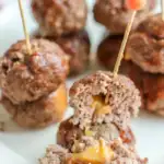 BBQ meatballs easy snack - meatballs on a white plate with toothpicks in the center