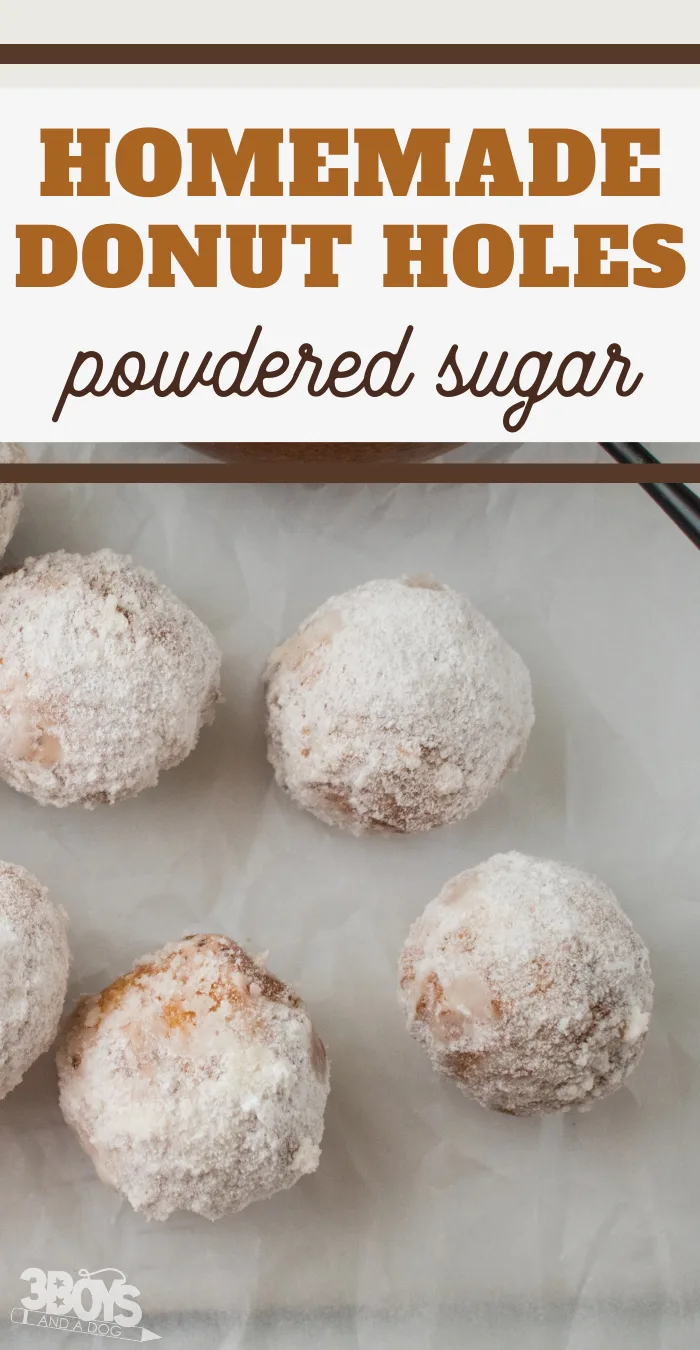 pin image that reads homemade donut holes powdered sugar with fried donut holes on the table 
