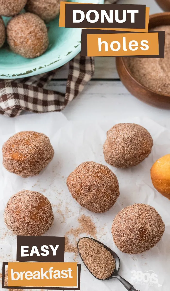 pin image that reads donut holes easy breakfast with a lot of cinnamon sugar donut holes and a spoonful of cinnamon sugar
