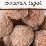 pin image that reads homemade donut holes cinnamon sugar with a close up of fried donut holes