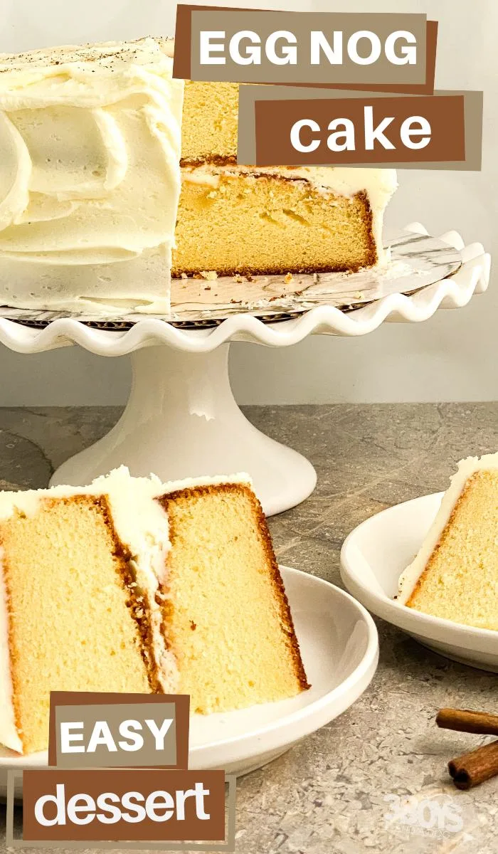 pin image that reads egg nog cake easy dessert with cake on a cake stand and a slice of cake on a white plate