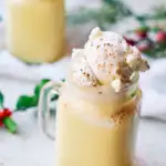 mug of eggnog float with whipped cream on top