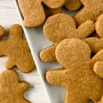 pin image that reads gingerbread cookies easy dessert with gingerbread cookies on a plate