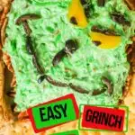 closeup of easy holiday cheeseball recipe without refrigeration with text which reads easy Grinch Cheese Ball