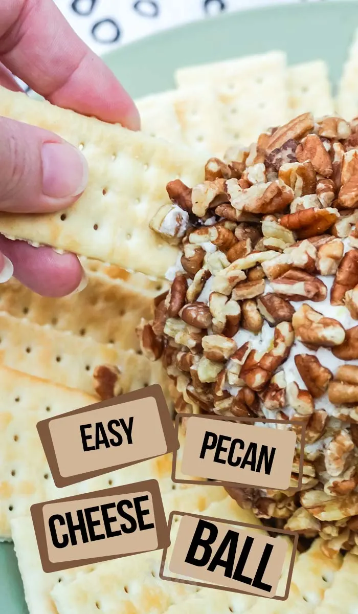 scooping a cracker full of cheeseball with pecans with text which reads easy pecan cheese ball