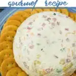 easy hawaiian cheeseball on a plate with crackers with text which reads hawaiian cheese ball gourmet recipe