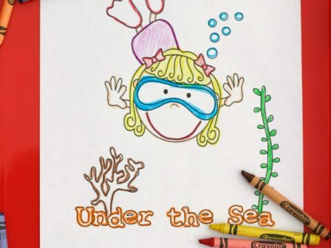 A coloring page featuring a child snorkeling underwater with a turtle, plant, and wavy lines. The words Under the Sea are colored below. Crayons are scattered around the page.