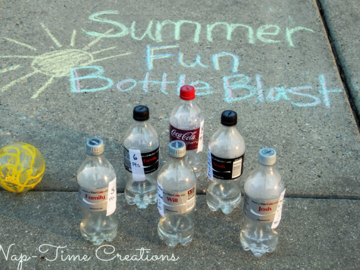 A sidewalk display titled Summer Fun Bottle Blast in chalk features six empty plastic bottles arranged in a triangle, with a yellow perforated ball nearby. The text Nap-Time Creations is visible at the bottom.