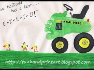 A childs drawing of a green tractor labeled Little Deere with three yellow chicks in front. The text reads Old MacDonald had a farm... E-I-E-I-O! URL is at the bottom.