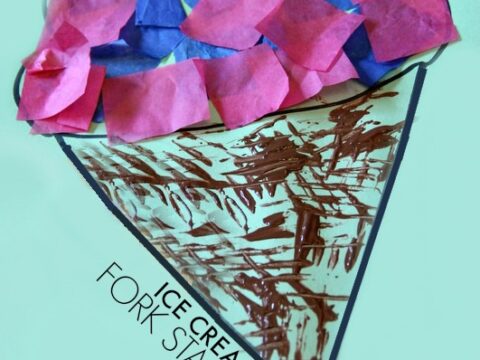 A craft project of an ice cream cone made with pink and blue tissue paper for the ice cream and brown paint applied with a fork for the cone texture.