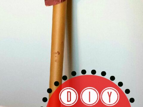 A handmade stick horse made from brown painted paper for the head and a wooden stick for the body, with white yarn for the mane. The image includes text: DIY Horse for Kids.