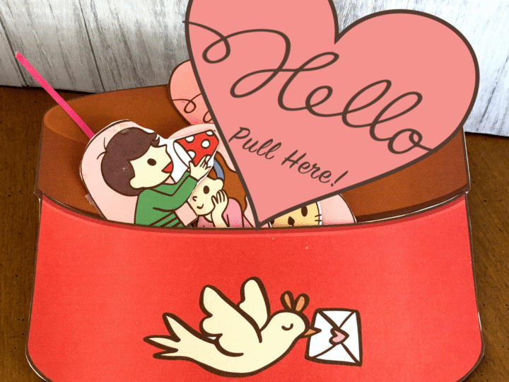 A red box with a heart and cartoon characters.