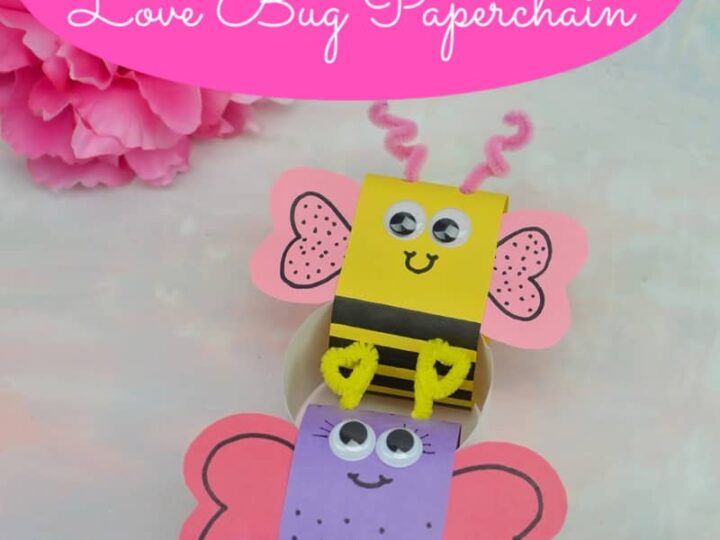 Valentines Day craft featuring colorful paperchain love bugs with wings and googly eyes. The top has text saying Valentines Day Love Bug Paperchain. Pink flowers decorate the backdrop.