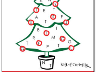 Illustration of a Christmas tree with various letters scattered across it. Letters T are circled in red. The text at the bottom reads, Find the Letter T for Tree. A star sits atop the tree.