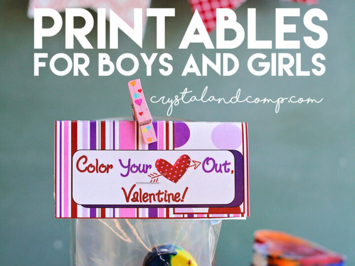 A heart-shaped multicolored crayon is in a clear bag with a label that says Color Your Heart Out, Valentine! The bag is clipped to a card and placed in front of fabric bunting. Text reads Crayon Valentine Printables for Boys and Girls.