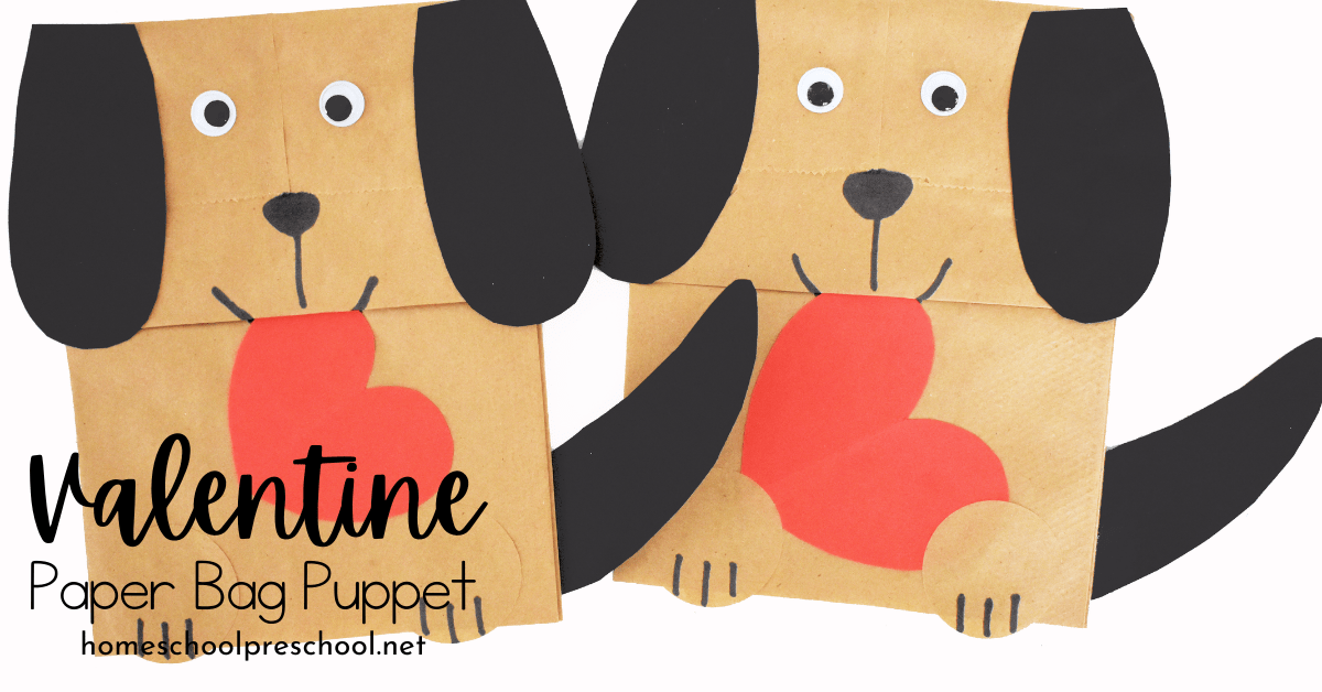 Two paper bag puppets designed to look like dogs with floppy black ears. Each holds a red heart between its paws. The text reads Valentine Paper Bag Puppet and includes a URL at the bottom.