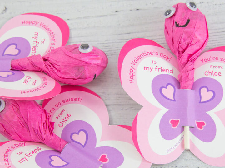 Three butterfly-themed Valentines cards with pink and purple wings. Each has a lollipop as the body and googly eyes on top, creating a whimsical face. Cards read Happy Valentines Day! To: my friend From: Chloe with heart designs.