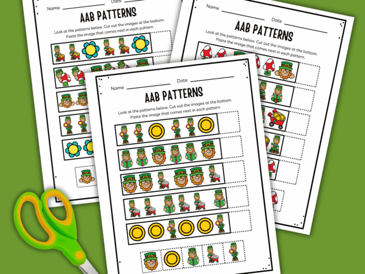 Three worksheets titled AAB Patterns featuring sequences with flowers, mushrooms, and leprechauns. Students cut and paste images to complete patterns. A pair of green and yellow scissors is beside the sheets on a green background.