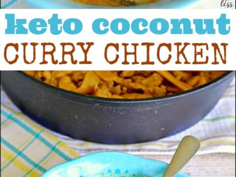 A blue bowl filled with keto coconut curry chicken, featuring pieces of chicken and bamboo shoots in a creamy curry sauce. A pot with more curry is in the background on a plaid cloth. Text reads keto coconut curry chicken.