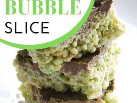 A stack of three Mint Aero Rice Bubble Slices, featuring layers of green rice bubbles and a chocolate topping. The text Mint Aero Rice Bubble Slice is visible on the top left.