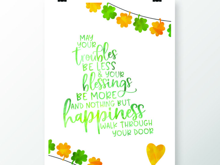 A white poster with green and orange watercolor text: May your troubles be less and your blessings be more and nothing but happiness walk through your door. Features clovers and a yellow heart, with clover garlands at the top and bottom.